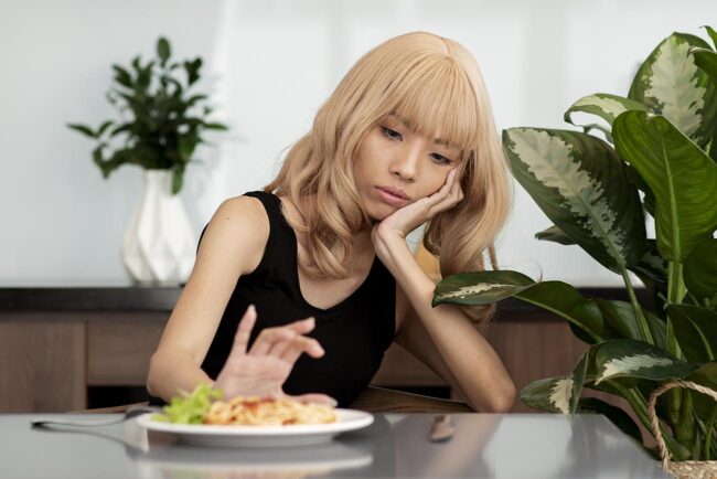 Pessoa com transtorno alimentar.