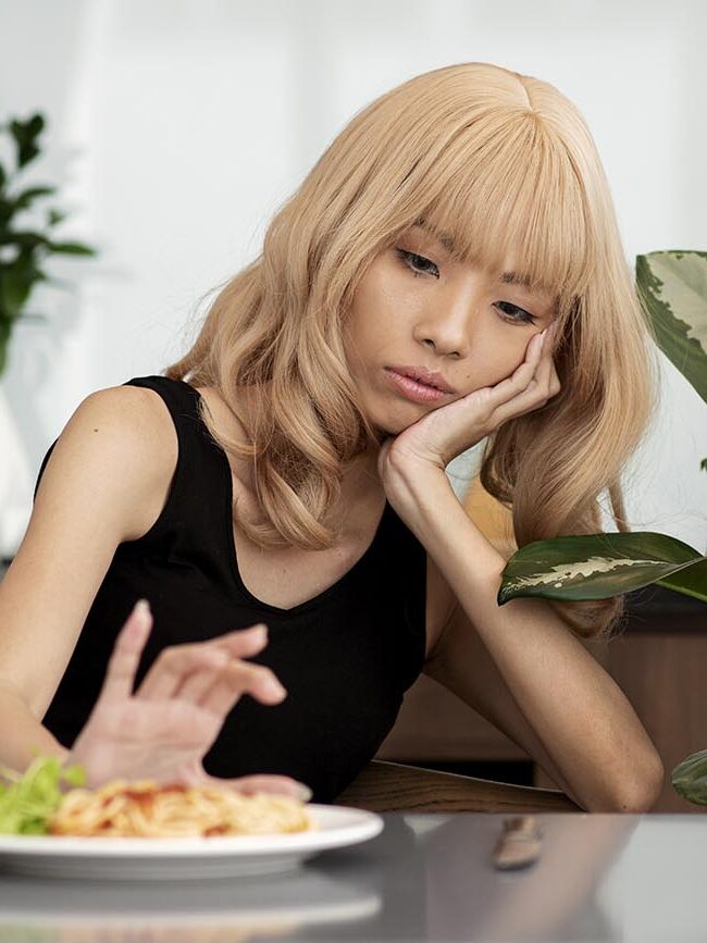 Pessoa com transtorno alimentar.